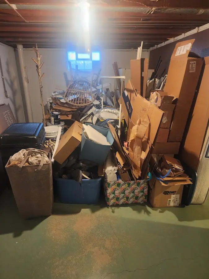 Roll-off dumpster container at job site for Construction Dumpster Rental in Malta